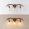 JONATHAN Y JYL6309A Wyatt 25.5″ 3-Light Southwestern Bohemian Resin/Seeded Glass Faux Antler LED Vanity Light, Brown Wood Finish for Bathroom Vanity and Kitchen