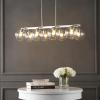 JONATHAN Y 33.5″ Nickel/Clear 8-Light Farmhouse Bohemian Iron Linear LED Pendant, Clear Glass Shade for Kitchen Island, Dining Room, Sloped Ceiling Compatible (JYL7570B)(Nickel)