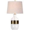 JONATHAN Y 25.5″ Clear Glass and Brass Gold Table Lamp, Modern Farmhouse Banded Bottle Lamp for Living Room Bedroom, Gray Linen Drum Shade, LED Bulb Included, UL Listed JYL4001A
