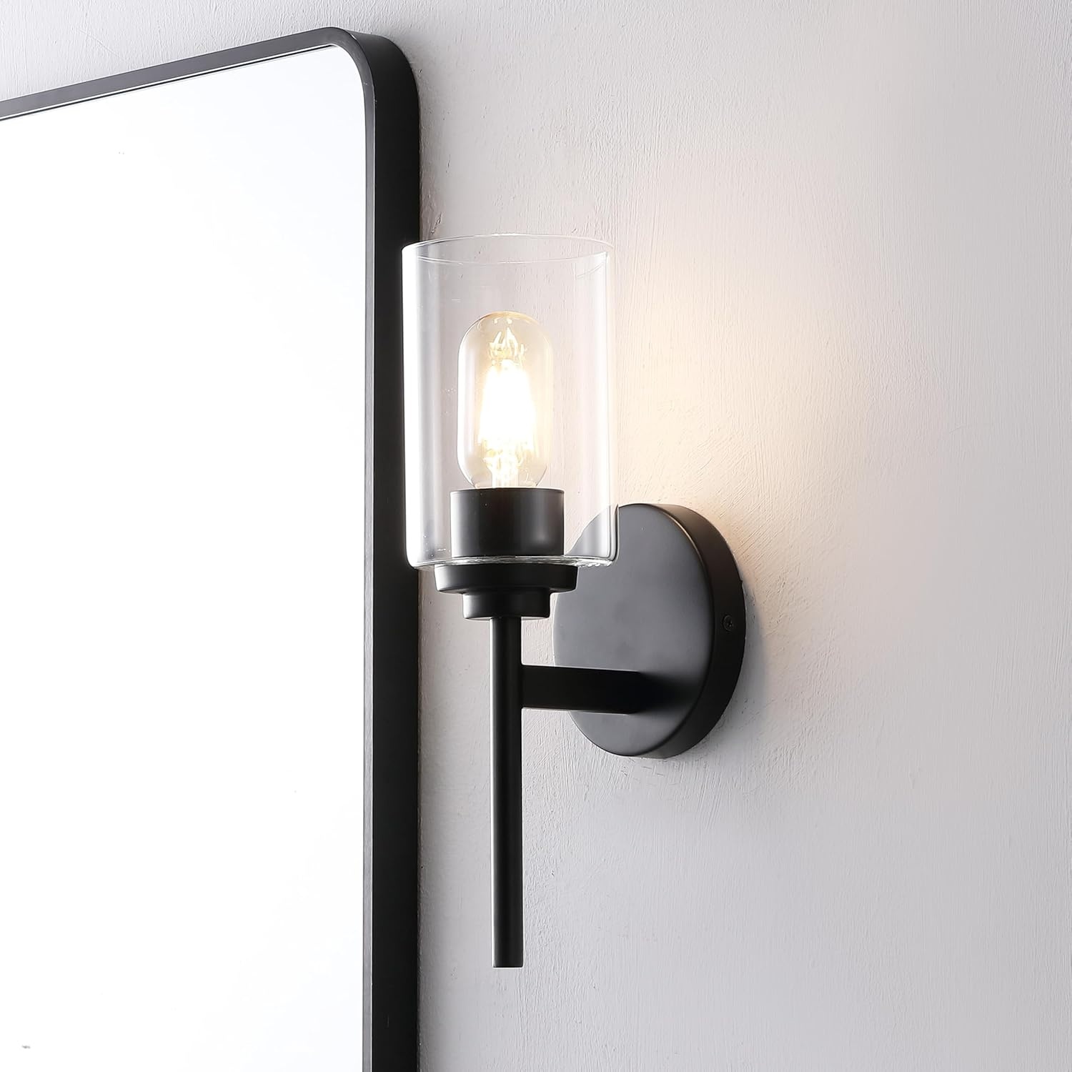 image:imageJONATHAN Y 13 Black Clear 1Light Metal Cylinder Wall Sconce Farmhouse Industrial Modern Indoor Lighting for Hallway Bathroom with Glass Shade LED Bulb Included JYL9547DBlack